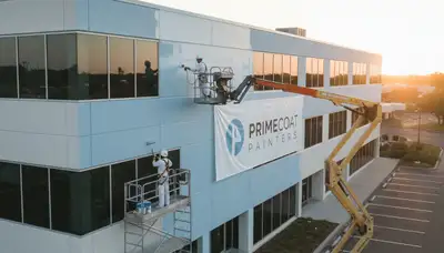 Professional commercial painters working on a business exterior in Berkeley, CA