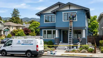 Professional house painters working on exterior home repaint in Berkeley, CA